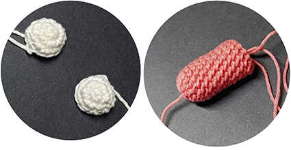 crochet puffer fish amigurumi eyes and inner mouth pieces before attaching to the toy